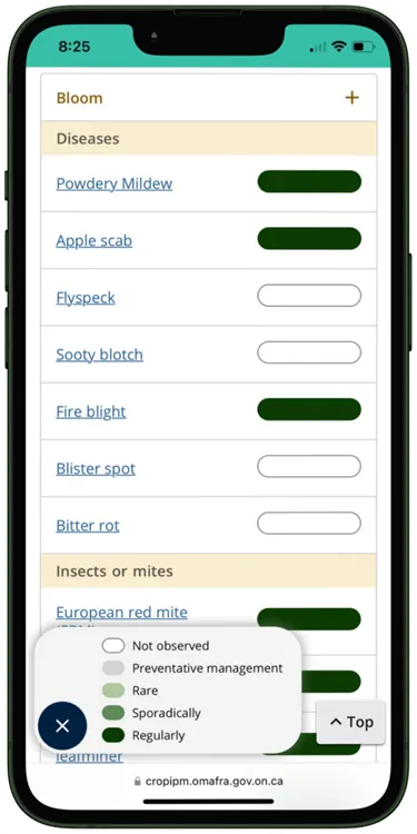 Phone screen with scouting calendar for pests of apples displayed